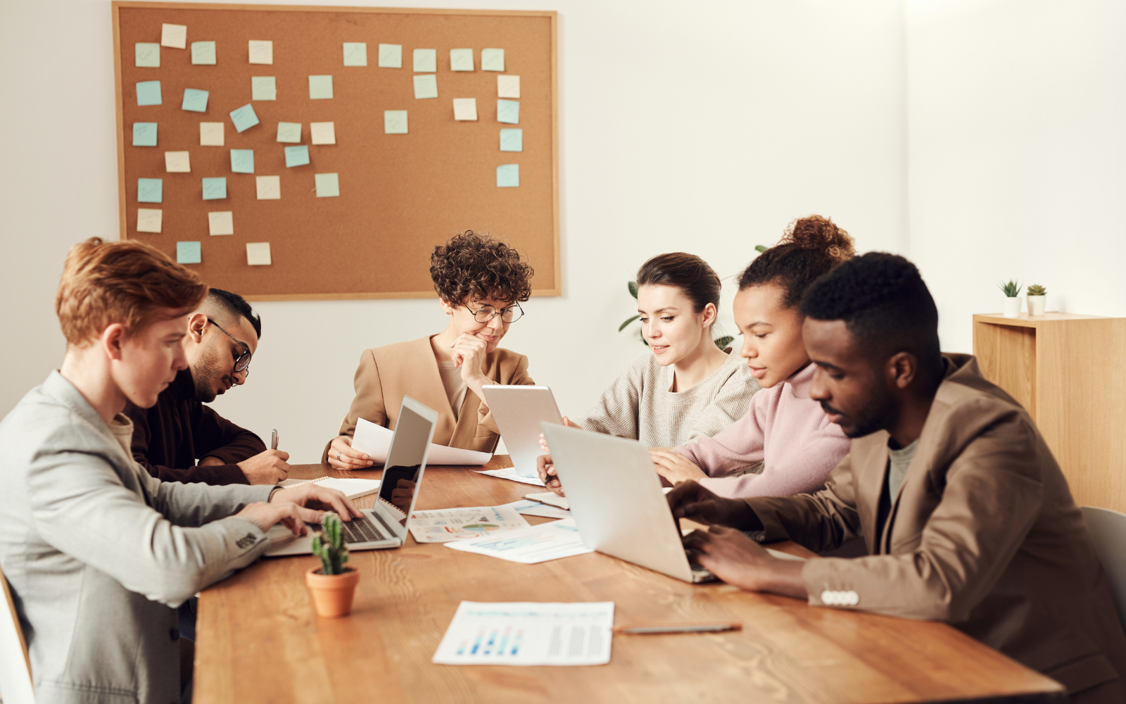 Team collaborating together around a table